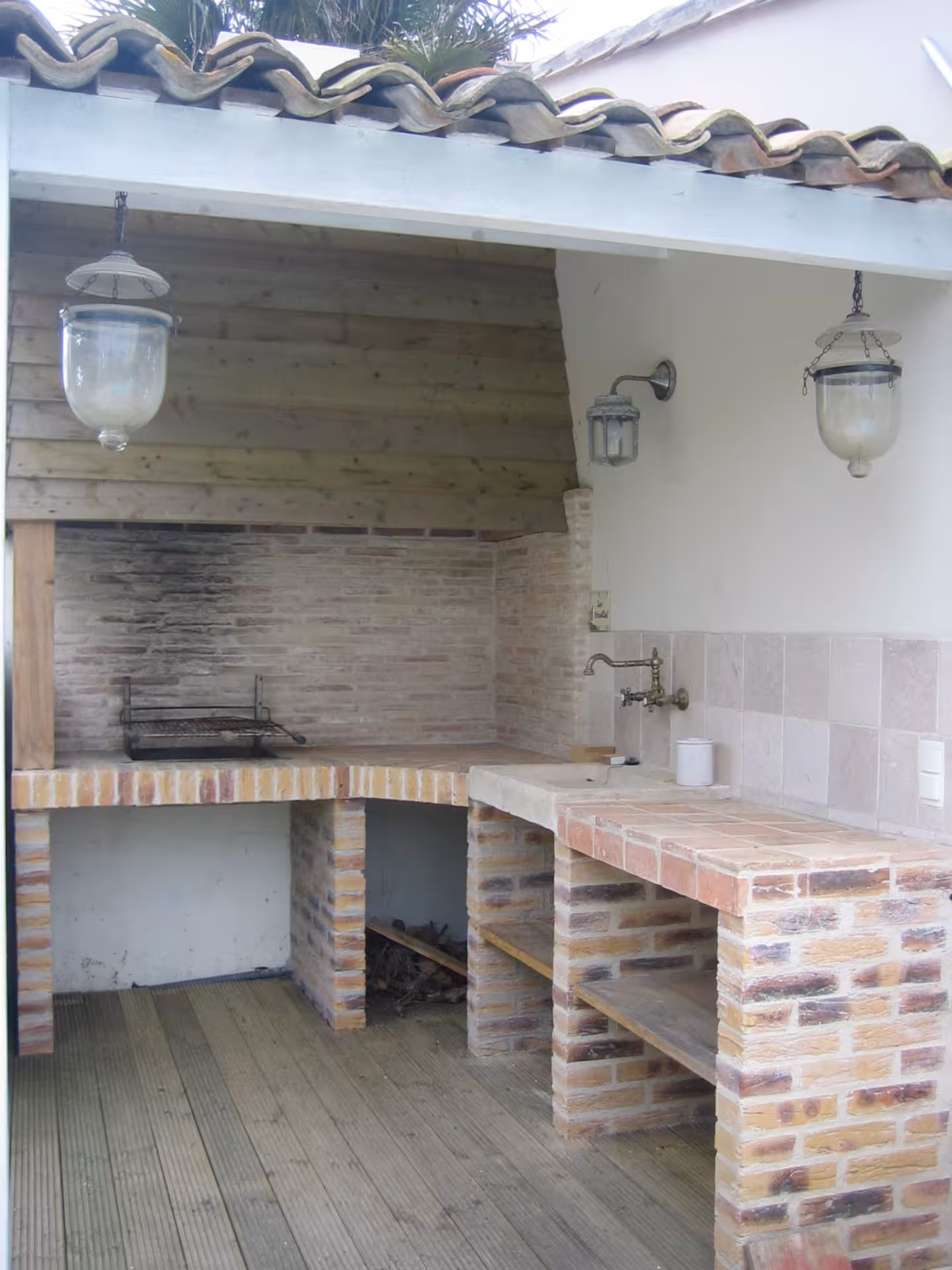 Outdoor kitchen and barbecue area on the terrace